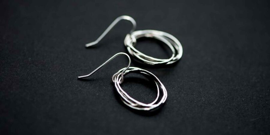 Fáinne cluaise gleoite uaidh Lynsey de Burca