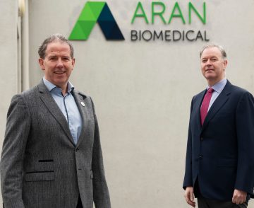 Two men outside of the Aran Biomedical facility in An Spidéal in Galway