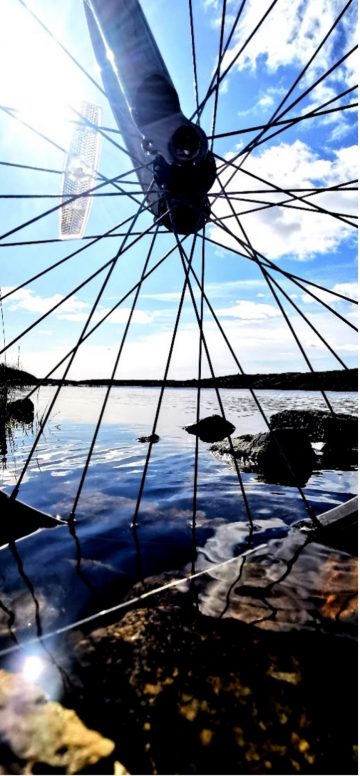 Bicycle wheel and beautiful lake in Gaeltacht